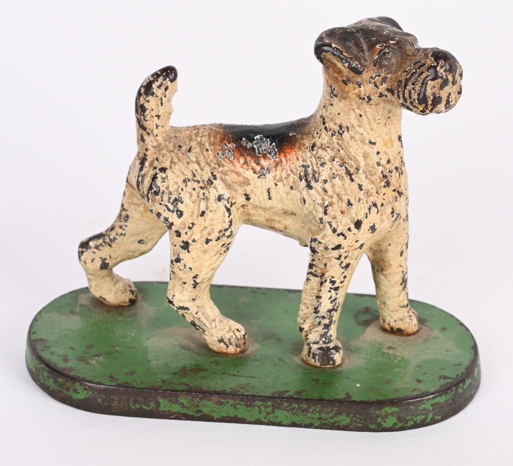HUBLEY CAST IRON FOX TERRIER ON BASE DOOR STOP: Hubley cast iron Fox Terrier on Base Door Stop. All original with decent paint. 5" Very Good-Excellent