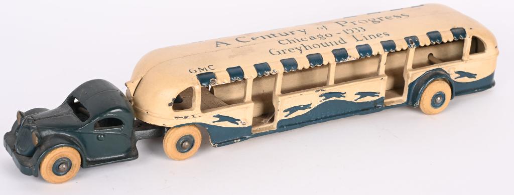ARCADE CAST IRON 1933 CENTURY OF PROGRESS BUS: Arcade cast iron A Century of Progress 1933 Chicago Greyhound Line GMC Bus. Scarce Large version. All original with exceptional paint. No breaks or repairs. 14" Excellent