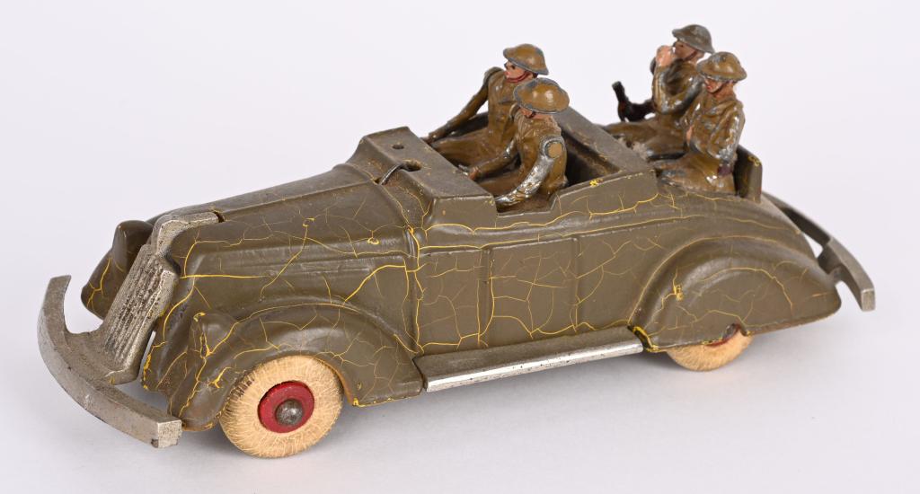 KENTON CAST IRON ARMY STAFF CAR w/ FIGURES: Sold by Warren Company, very rare example, made in the late 1930's, designed using Kenton's roadster model fully painted in military olive drab green. Includes 4 lead soldiers. Missing passengers mach