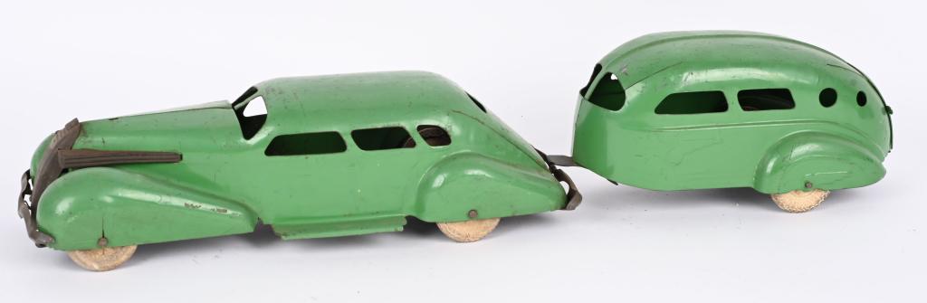 WYANDOTTE PRESSED STEEL LASALLE & TRAILER: Wyandotte pressed steel LaSalle and Trailer. All original with very nice paint. Toy still has all original white rubber tires. 26" Excellent