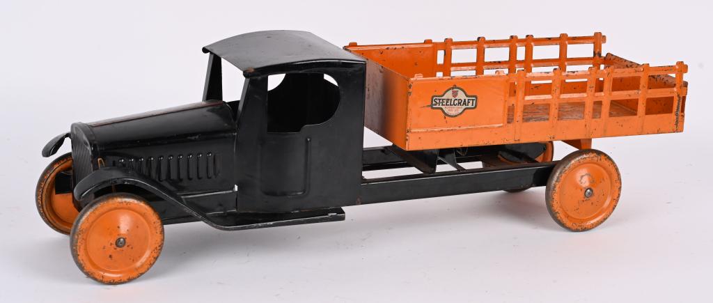 STEELCRAFT PRESSED STEEL STAKE BED TRUCK: Steelcraft pressed steel Stake Bed Truck. All original with nice paint and decals. Has some scratches in bed. 22" Excellent