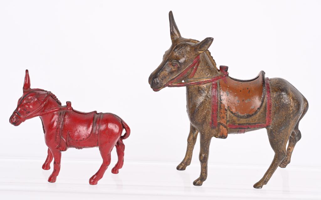 2- CAST IRON DONKEY STILL BANKS (1 of 2)