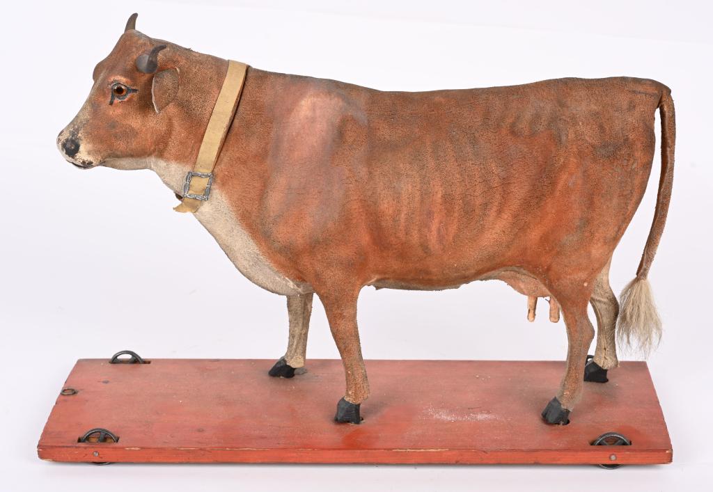 COMPOSITION COW ON PLATFORM WITH WHEELS (1 of 3)