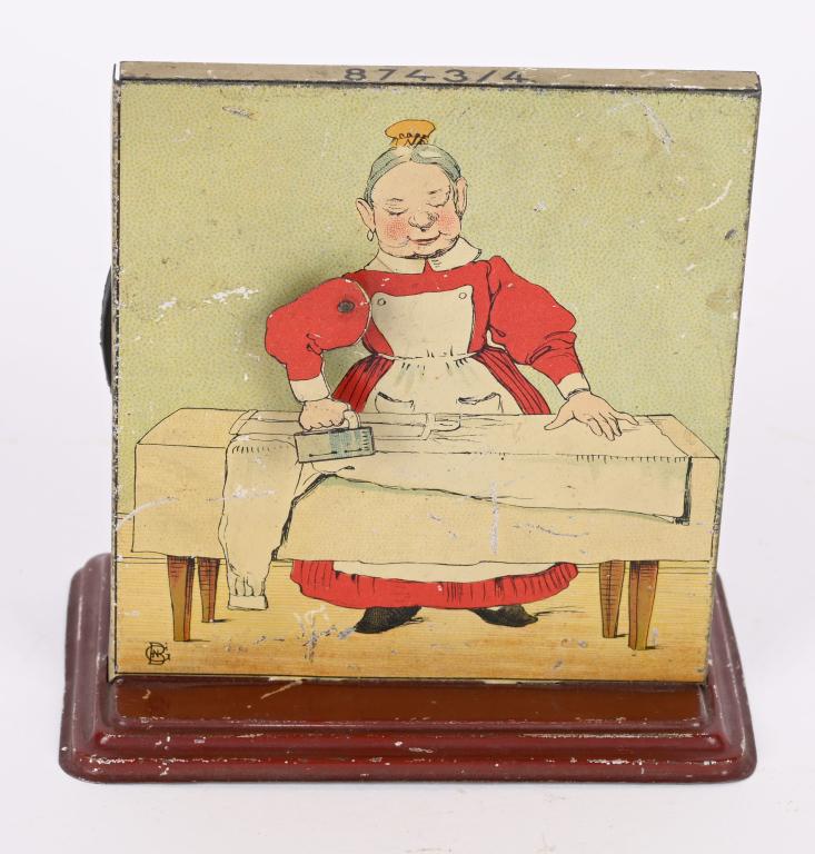 GERMAN STEAM TOY LADT IRONING CLOTHES (1 of 2)