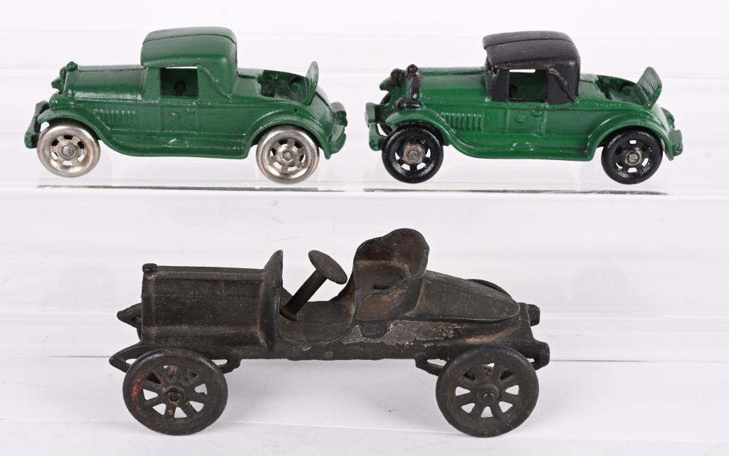 3- CAST IRON TOY AUTOS (1 of 4)