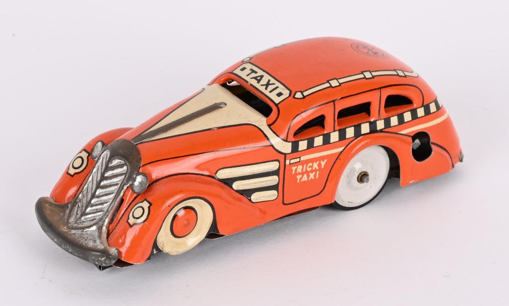 MARX TIN WINDUP TRICKY TAXI (1 of 3)