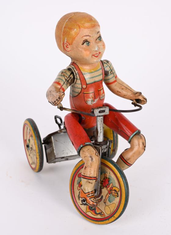 UNIQUE ART TIN WINDUP KIDDY CYCLIST (1 of 3)