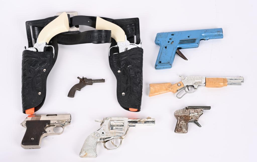 LOT OF CAP GUNS: Includes Pony Boy Holster Set, Express 7, Private Eye, Spit-Fire, and More. Largest 10" Very Good-Excellent