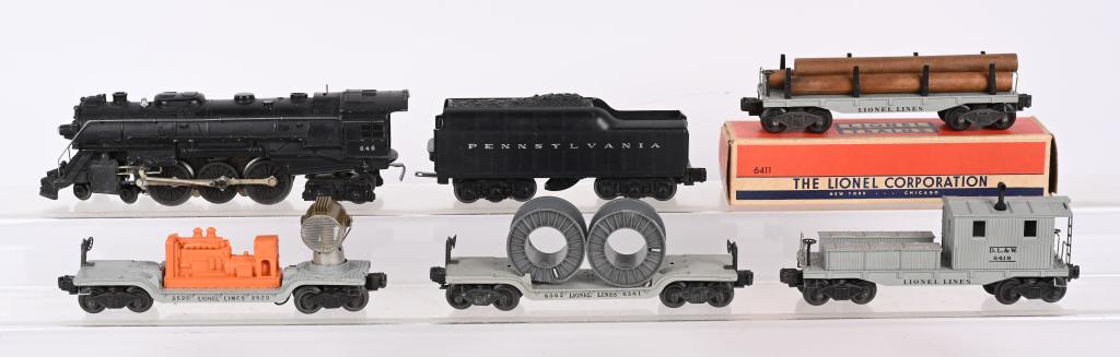 LIONEL LOCOMOTIVE 646, TENDER, & 4 FREIGHT CARS: Includes 646 Locomotive, 2671W Tender, boxed 6411 Flat car, 3520 Searchlight car. 6561 Cable Reel Car, and 6419 Work Caboose. Excellent