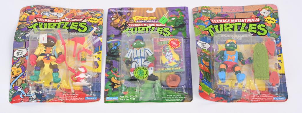 3- TEENAGE MUTANT NINJA TURTLES: Includes TMNT 1991 Hose Em Down Don, 1991 Skateboardin Mike, and 1994 Grand Slammin Raph. All minty on Cards