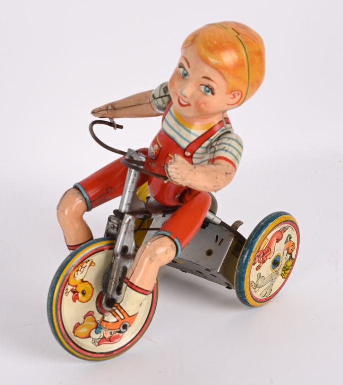 UNIQUE ART TIN WINDUP KIDDY CYCLIST (1 of 3)