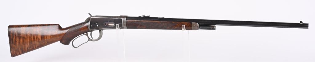 DELUXE WINCHESTER MODEL 1894 RIFLE: SERIAL 54162. BARREL 26". CALIBER 30-30. MADE IN 1896. Factory letter address to Hank Williams Jr in July of 1971 states it was shipped on 1-25-1899 with octagon barrel, half magazine, take down, chec