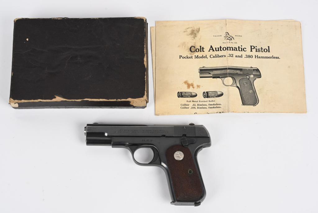 BOXED COLT MODEL 1908 SEMI AUTO .380 PISTOL: SERIAL NUMBER 110531. BARREL 3 3/4". CALIBER .380 ACP. MADE IN 1932. Standard features include blue finish, fixed sights, silver medallion checkered walnut grips, original stamped two tone tampered ma