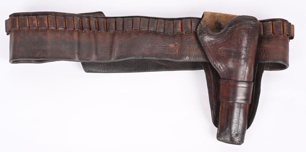 RARE 1880'S J.S. COLLINS WYO HOLSTER BELT COLT RIG: This is a rare matching set to include the single loop holster that features a , full flap, is border tooled and branded J.S.Collins & Co Cheyenne Wyo .45 (territory at that time) The 3 1/4" textured 