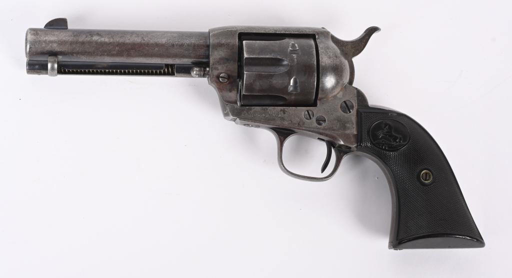 PRE WAR 1ST GEN COLT SAA REVOLVER: SERIAL 337340. BARREL 4 3/4". CALIBER 32-20. MADE IN 1919. Matching numbers on frame, trigger guard and back strap. Standard blue and case color with Colt gutta percha grips. Condition. There is still