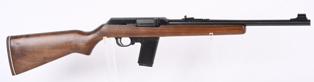 MARLIN MODEL 45 SEMI AUTO CARBINE: SERIAL 13828995. BARREL 16.5". CALIBER 45 ACP. Known as the camp carbine. Made from 1985-1999. Blue finish, hooded ramp front sight, sporting rear sight, plain pistol grip walnut stock, red rubber rec
