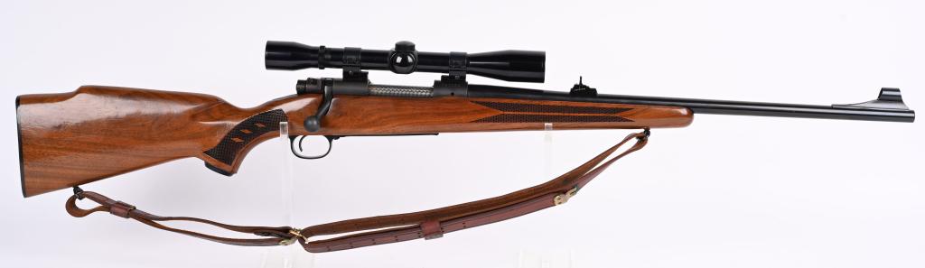 WINCHESTER MODEL 70 RIFLE .225 WINCHESTER: SERIAL 760020. BARREL 22". CALIBER .225 WIN. MADE IN 1965. Introduced in 1964 to replace the .219 Zipper. Jeweled bolt has matching etched serial number. Features high polish blue barrel that sports a