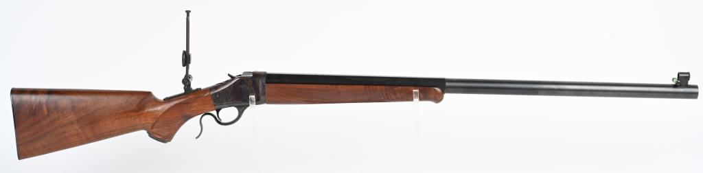 BROWNING MODEL 1885 HEAVY BARREL SINGLE SHOT RIFLE: SERIAL 10160NP2B7. BARREL 30". CALIBER 45-70. Hi Wall style single shot features octagon to round barrel in blue finish with rear sight removed and spirit level front sight. Frame & lever are case col