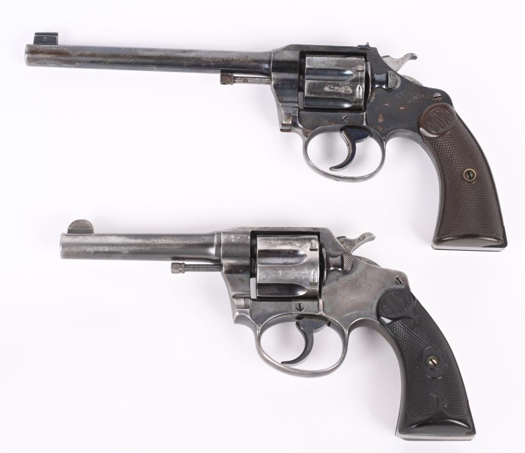TWO PRE WAR COLT REVOLVERS: A. POLICE POSITIVE TARGET 22 WRF. SERIAL 2329. Target front and rear sights, gutta percha grips with chip on right panel. B. POLICE POSITIVE .38. SERIAL 108290. Gutta percha grips with chip on right p