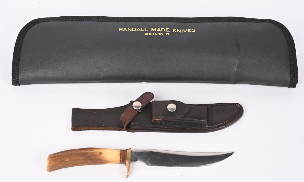 EARLY RANDALL MODEL 3 HUNTER W/ STAG HANDLE: 6" carbon steel blade with Randall touch mark on left side; Single brass guard with wide red, white and brown spacers. Stag handle with early brass pin through tang. Rough Back Johnson scabbard with r