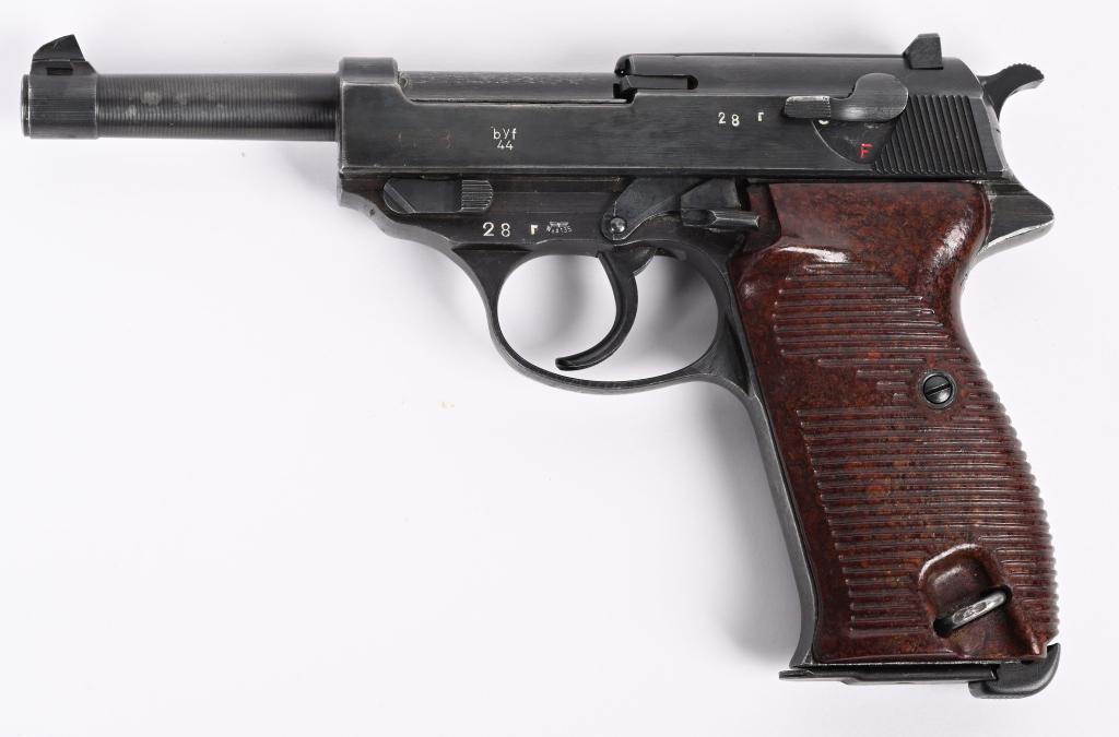 WW2 BYF44 CODE P-38 PISTOL BY MAUSER: SERIAL NUMBER 28r BARREL 4 3/4" CALIBER 9MM PARA MANUFACTURED 1944. Produced by Mauser with blue finish and brown bakalite grips. Eagle 135 inspections and JVD marked magazine. All matching numbers an