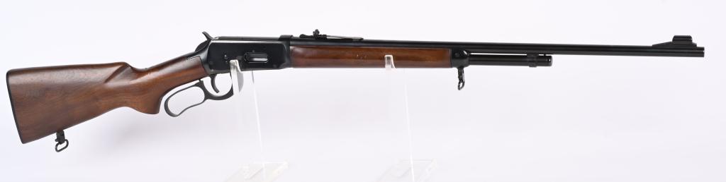 WINCHESTER MODEL 64-A LEVER ACTION RIFLE: SERIAL 3792465. BARREL 24". CALIBER 30-30. MADE IN 1972 Features a blue finish, full round barrel, 2/3 magazine, hooded ramp front sight, sporting rear sight, walnut plain pistol grip stock with Winch