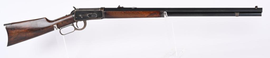 WINCHESTER MODEL 1894 RIFLE: SERIAL 232948. BARREL 26". CALIBER 30-30. MADE IN 1904. Features full octagon barrel, full magazine, flat top rear sight, bead front sight, blue finish, walnut stocks, rifle butt plate. Condition. Nic