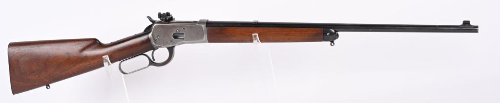 WINCHESTER MODEL 53 LEVER ACTION RIFLE: SERIAL 6877. BARREL 22". CALIBER 32-20. MADE IN 1926. Standard 3rd year production with round barrel , half magazine, walnut stocks, metal butt plate, dove tail front sight on base, rear sight slot fi