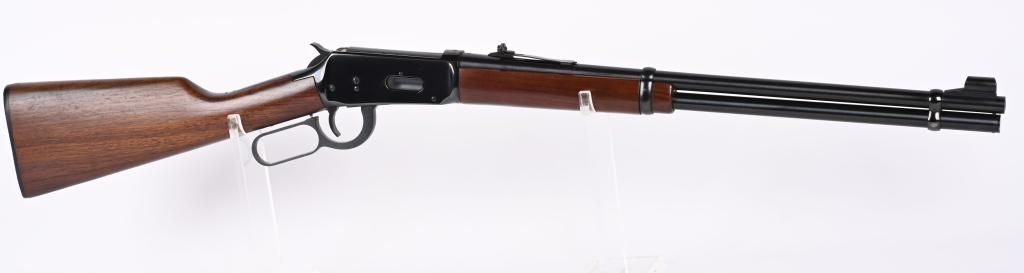 WINCHESTER MODEL 94 CARBINE: SERIAL 4014581. BARREL 20". CALIBER 30-30. MADE IN 1974. Features blue finish, full magazine, ramp front sight, sporting rear sight, walnut stocks, black Winchester butt plate. Condition. Gun is solid
