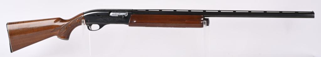 REMINGTON 1100 12 GA SEMI AUTO SHOTGUN: SERIAL NUMBER N444203V BARREL 28" CALIBER 12 GAUGE MANUFACTURED REMINGTON. Blue finished 28" vent rib barrel with full choke.2-3/4" chamber, scroll engraved receiver and checkered pistol grips walnut 
