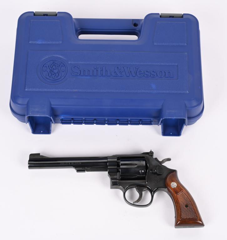 SMITH & WESSON MODEL 17 K22 MASTERPIECE: SERIAL NUMBER CNY7239 BARREL 6" CALIBER .22 LONG RIFLE MANUFACTURED 2010. Blue finished with 6 shot fluted cylinder. K frame square butt frame with checkered service stocks. Smooth service trigger wit