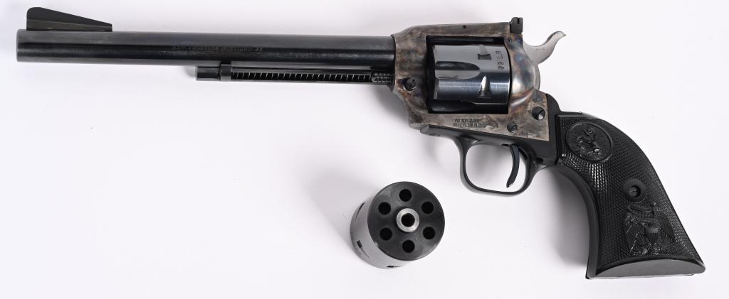 COLT NEW FRONTIER BUNTLINE 22 CONVERTABLE REVOLVER: SERIAL NUMBER G167260 BARREL 7 1/2" CALIBER .22 LONG RIFLE / .22 MAGNUM MANUFACTURED 1976. Blue and case color finished with adjustable rear sight and fitted with checkered black plastic grips with Co
