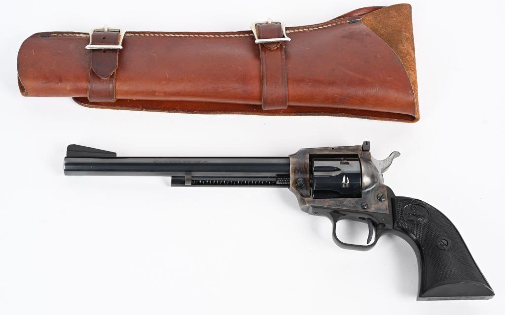 COLT NEW FRONTIER BUNTLINE 22 REVOLVER: SERIAL NUMBER G124646 BARREL 7 1/2" CALIBER .22 LONG RIFLE MANUFACTURED 1975. Blue finished barrel and cylinder with case colored flattop frame with adjustable sights. Checkered black plastic grips wi