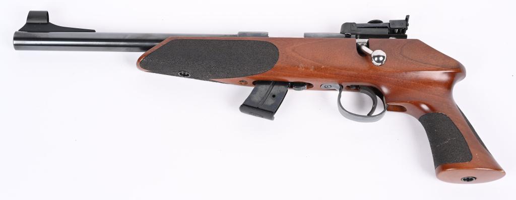 ANSCHUTZ-EXEMPLAR LH BOLT ACTION 22 PISTOL: SERIAL 1335004P. BARREL 10". CALIBER .22 LR. Magazine fed ( 5 shot included), LH bolt, Anschutz target rear sight, Hooded ramp front sight, heavy high polish blue barrel, adjustable trigger, polished 