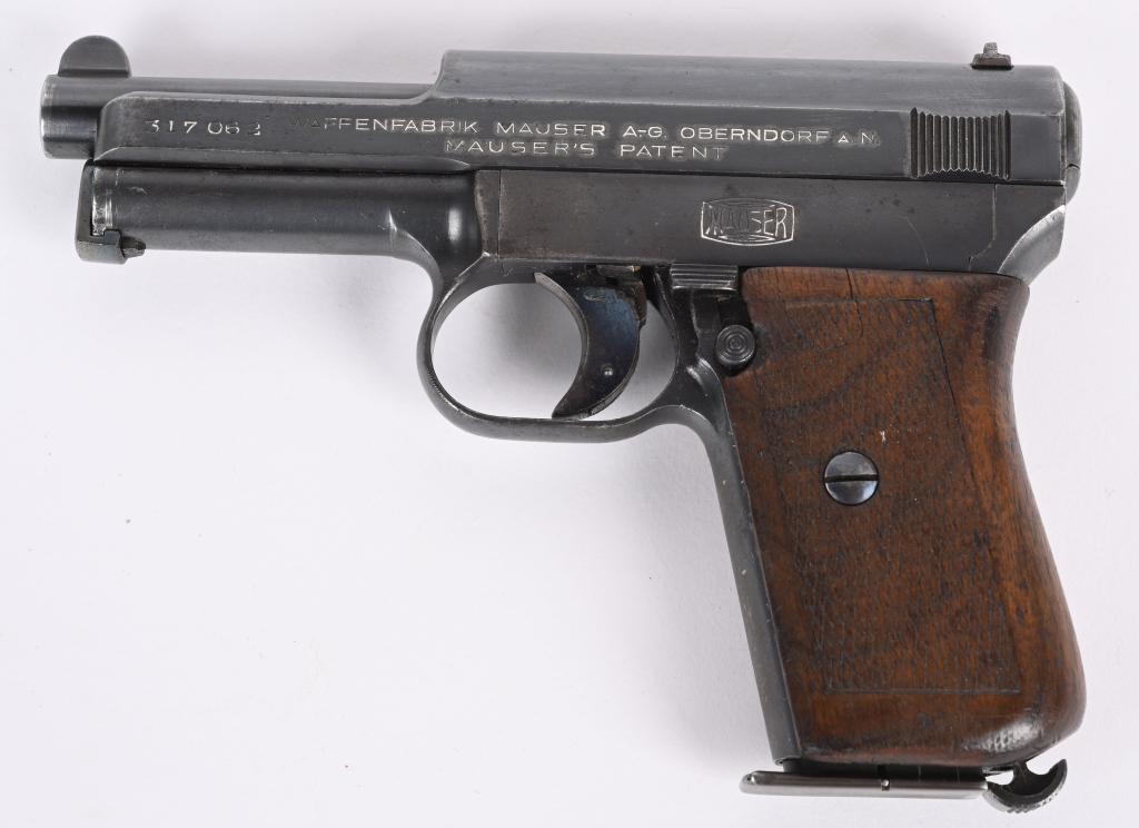 MAUSER MODEL 1934 7.65 PISTOL: SERIAL NUMBER 317062 BARREL 3 3/8" CALIBER 7.65 / .32 ACP MANUFACTURED 1934-1945. Blue finished with checkered walnut grips. Matching numbers on frame, slide and barrel. Marked "GERMANY" for export. U