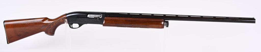 REMINGTON MODEL 1100 SEMI AUTO SHOTGUN: SERIAL N592059V. BARREL 28". GAUGE 12. CHAMBER 2 3/4". CHOKE - MOD. LOP 14". Features take down, semi auto, blue finish, vent rib, etched frame, press checkered pistol grip stock with cap and plastic 