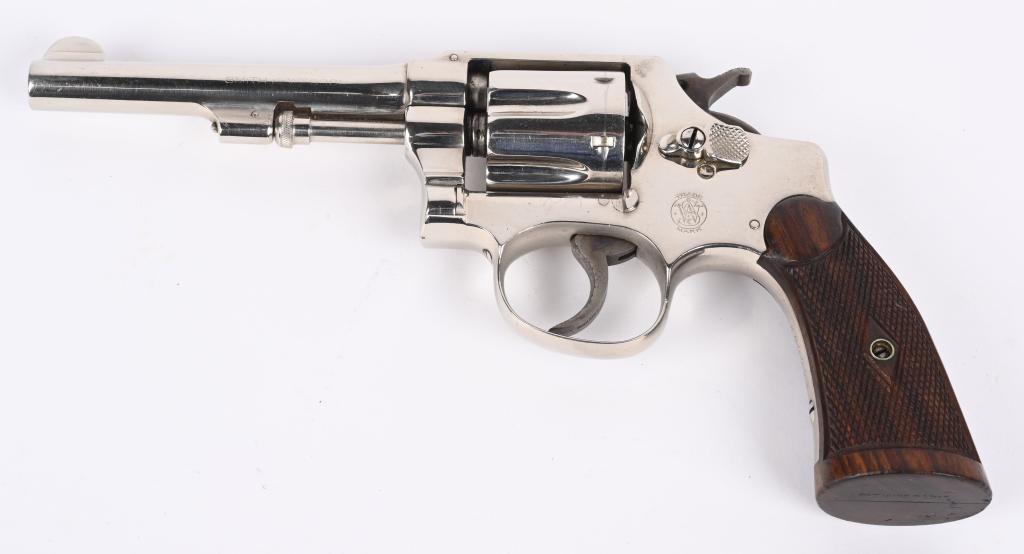 PRE WAR .32 HAND EJECTOR REVOLVER: SERIAL 460093. BARREL 4 1/4". CALIBER .32 S&W LONG. MADE PRE 1945. Built on round butt I-frame, 5 screw, pinned barrel, nickel finish with case color hammer & trigger. Diamond checkered walnut grips n