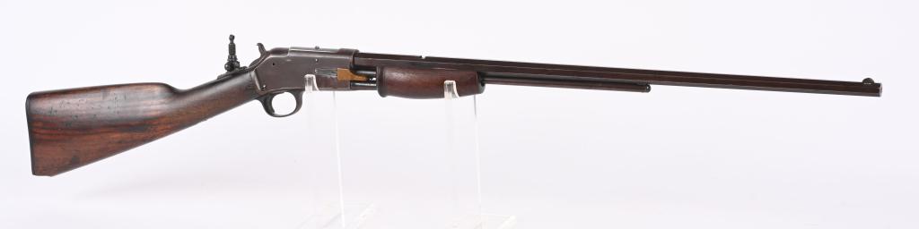 COLT SMALL FRAME LIGHTNING PUMP 22 RIFLE: SERIAL 85973. BARREL 24". CALIBER 22. MADE IN 1904. Features octagon barrel, half magazine, tang sight with no rear sight, blue finish, walnut stock with Colt gutta percha butt plate, one piece walnut