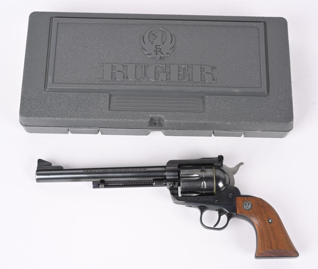 RUGER NEW MODEL BLACKHAWK 45 COLT: SERIAL NUMBER 46-56234 BARREL 7-1/2" CALIBER 45 COLT MANUFACTURED 1980. Blue finished, single action design with 6 shot fluted chamber. Transfer bar safety. Wood grips with factory monograms. CONDITIO