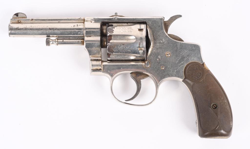 SMITH & WESSON 1ST MODEL HAND EJECTOR: SERIAL NUMBER 6641 BARREL 3 1/4" CALIBER 32 S&W MANUFACTURED 1896-98 . Smith & Wesson's first entry into the swing out cylinder design. Nickel finish with patent dates on cylinder and cylinder stop in