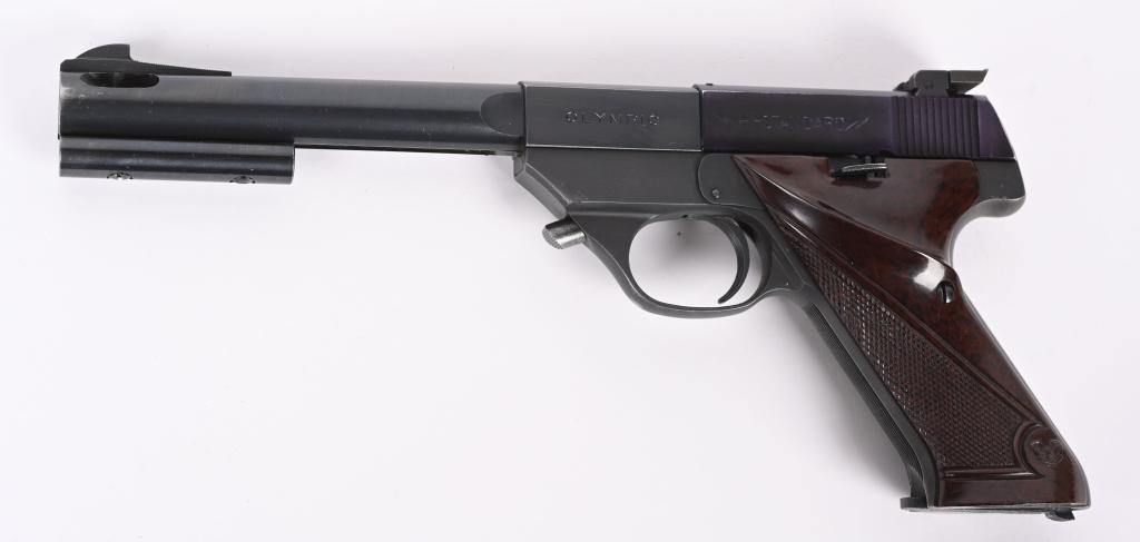 HI-STANDARD 101 OLYMPIC SEMI AUTOMATIC PISTOL: SERIAL: 707004. BARREL: 6-3/4". CALIBER: .22 SHORT. MANUFACTURED: 1956. Standard markings and features. Match barrel with factory adjustable weight and ported muzzle. Original blued finish and checker