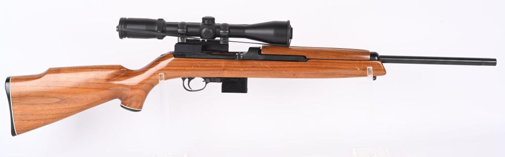 PLAINFIELD M-1 CARBINE SPORTER: SERIAL A173. BARREL 18". CALIBER .22 PMC Centerfire. Barrel has no sights. pistol grip sporting stock with Monte Carlo comb, magazine fed (included), wood handguard, B-Square mounts with Burris scope.