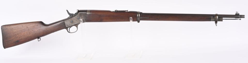 REMINGTON MODEL 1901 ROLLING BLOCK RIFLE: SERIAL NSN. BARREL 30". CALIBER 7MM STAMPED ON BARREL. Typical military style with full length walnut stock, two band, military rear ladder sight, sling swivels and walnut hand guard. Condition. Barre