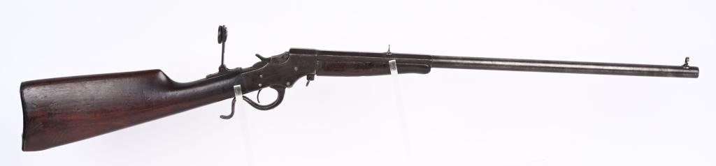STEVENS .32 LONG LEVER ACTION RIFLE: SN 106. BARREL 22", CALIBER .32. CONDITION Mostly smooth metal with dark patina and scattered light pitting. Good bore and rifling. Has folding tang peep sight, folding middle sight ,and folding globe