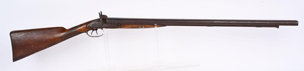 PARKER 12 GAUGE PERCUSSION SXS SHOTGUN: NSN. 32" cast SxS percussion barrels. Caliber about 12 gauge. CONDITION English proof marks under barrels. Dark bores. Actions work properly. Checkered stock has wear and crack behind left lock. ANTIQ