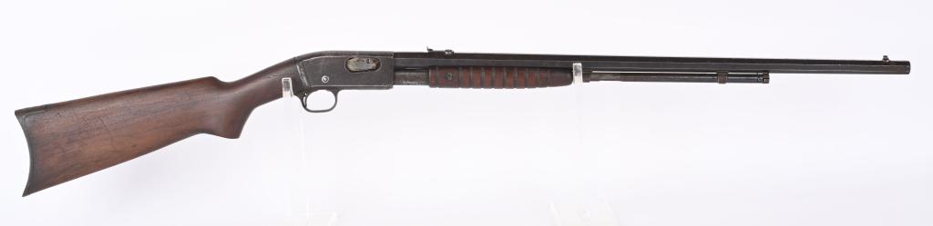 REMINGTON MODEL 12-C PUMP ACTION 22 RIFLE: SERIAL 692628. BARREL 24". CALIBER 22 RF. Octagon barrel, 2/3 mag, take down, blue finish, plain pistol grip walnut stock, grooved fore-arm Condition. Solid 70% blue with overall freckling on most met
