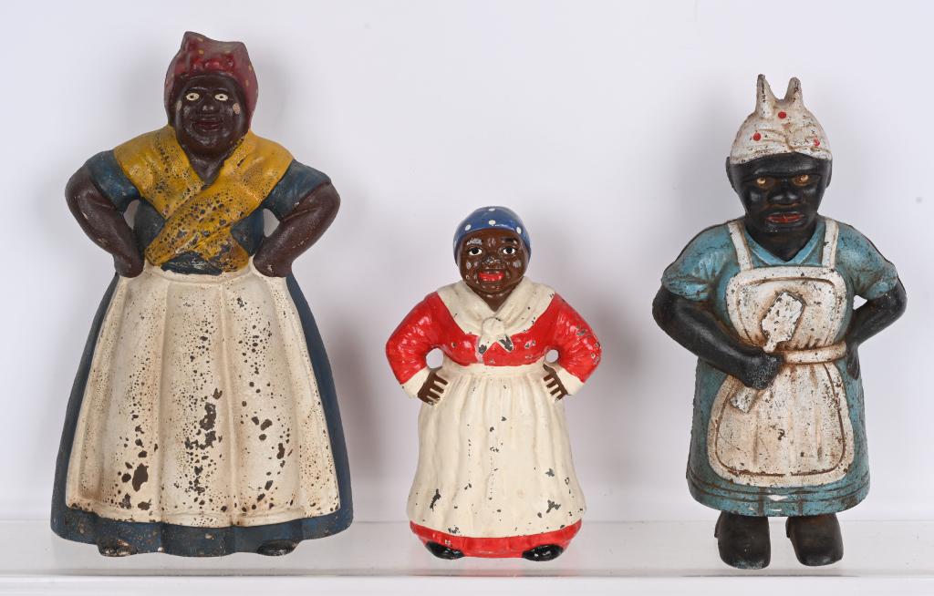3- CAST IRON MAMMY DOOR STOPS: All in original condition. 13" Excellent