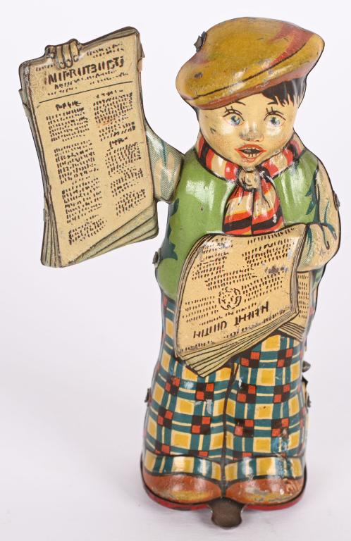GERMAN TIN WINDUP NEWS BOY (1 of 4)