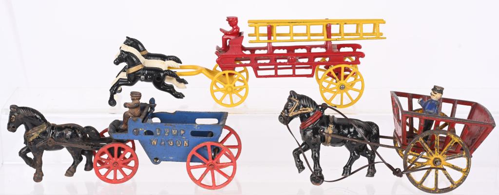 3- CAST IRON HORSE DRAWN WAGONS (1 of 2)