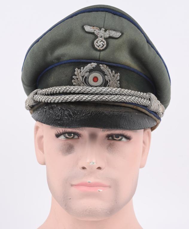 WWII NAZI GERMAN MEDICAL OFFICER CRUSHER VISOR HAT: Private purchase visor cap with a field-gray wool body and crown and a blue/green badge cloth centerband with cornflower blue wool waffenfarbe piping to the crown edge and both the top and bottom edge